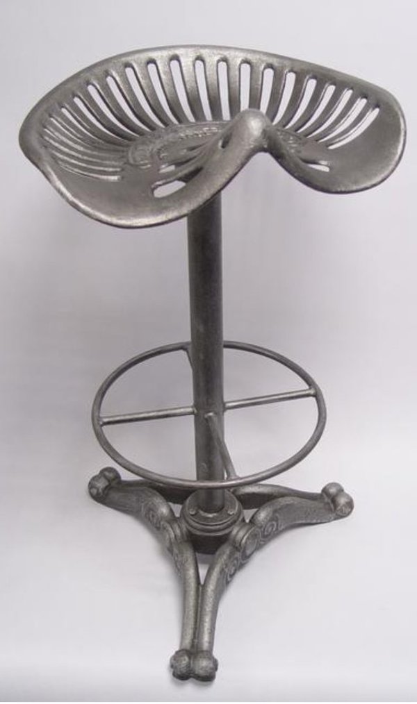 A CAST IRON BAR STOOL, OLD SILVER